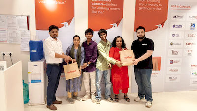 upGrad Mumbai office - student and parents with the counselling team after their study abroad session